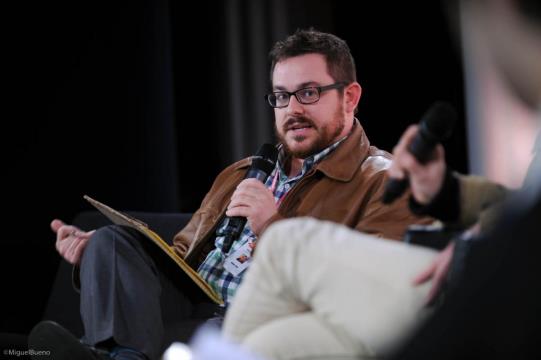 Josh giving a speech to a humanitarian summit in Geneva